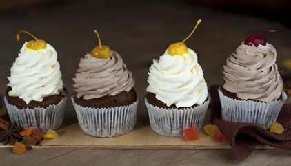 Chocolate Cupcakes with Cherry and Cream