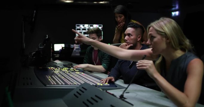 Operators In A Control Room At A Television Studio