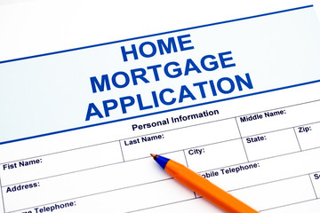 Home Mortgage Application with ballpoint pen