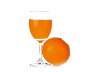 Orange, orange juice in a glass on a white background
