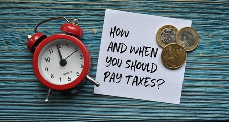 How and when you should pay taxes? - obrazy, fototapety, plakaty