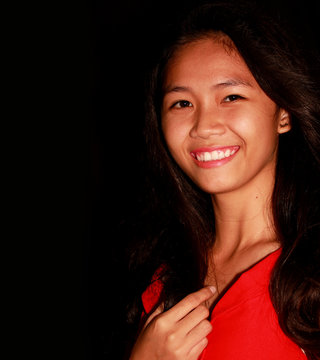 Young teenger Filipina wearing a smile