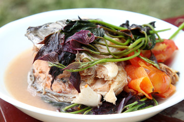 Filipino snapper fish head sinigang soup