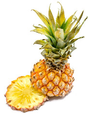 Fresh round pineapple slice and one whole pineapple with green leaves isolated on white background.