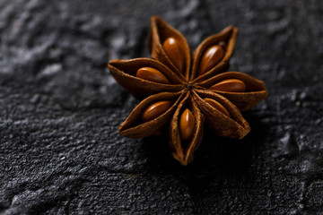 Star Anise on a black background. Closeup.