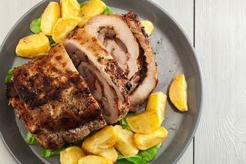 Roasted pork roll stuffed with other meat