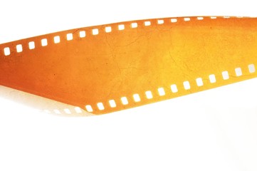 Yellow textured film strip on white background.