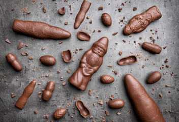 Delicious Christmas chocolate and sweets on rustic background