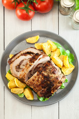 Roasted pork roll stuffed with other meat