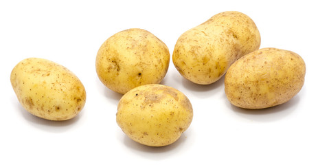 Group of several whole potatoes isolated on white background.