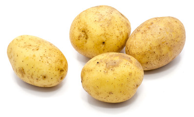 Four whole potatoes isolated on white background.