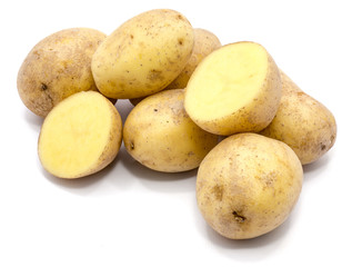 Group of whole potatoes and two halves isolated on white background.