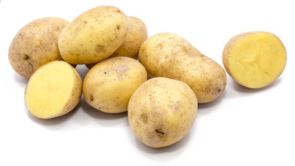 Group of whole potatoes and two halves isolated on white background.
