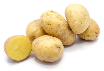 Group of whole potatoes and a half isolated on white background.