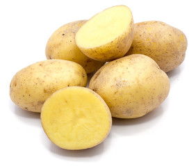 Group of whole potatoes and two halves isolated on white background.