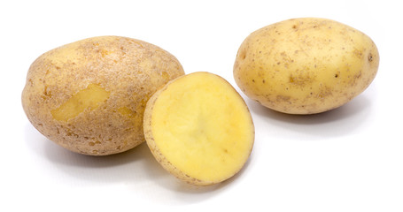 Two whole potatoes and a slice isolated on white background.