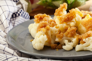 Vegetarian cooked cauliflower with bread crumb