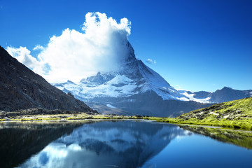 Reflection of Matterhorn in lake Riffelsee, Zermatt, Switzerland