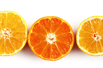 three halves of tangerine on white background isolate.