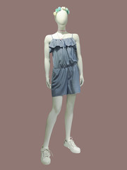 Full-length female mannequin.