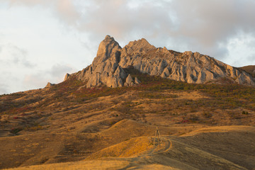 Rocks of the extinct volcano KaraDag in autumn