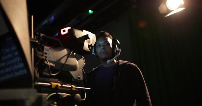 Portrait of a cameraman in a TV broadcasting studio