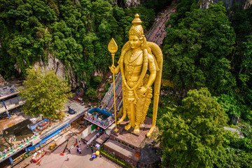 Batu Caves near Kuala Lumpur, Malaysia, aerial view of Lord Murugan Statue and entrance to the famous cave temples. © R.M. Nunes