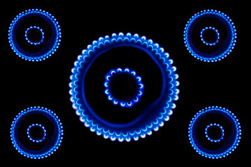 Burning gas burner in the darkness