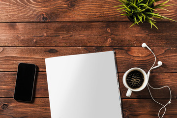 Blank open book, brochure or magazine on vintage wooden table background