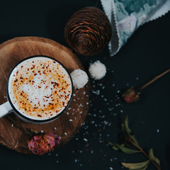 Cup of hot cocoa with chocolate on rustic background. Christmas chocolate drink. Christmas concept.