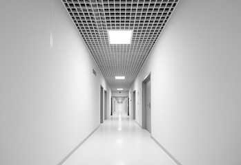 Long white empty corridor interior