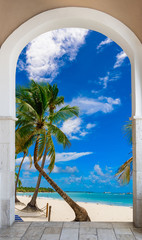 wooden open door arch exit to the beach caribbean dominican republic