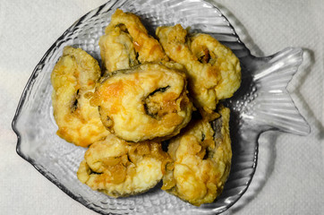 pieces of fried fish on a plate