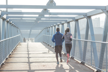 Man and Woman Running