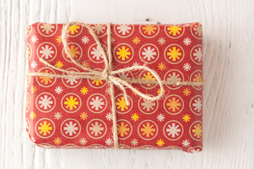 Christmas decorations and gift boxes on wooden background