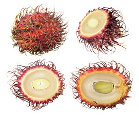 Unpeeled and cut in half ripe red rambutan fruit isolated on white background