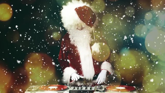 father christmas dancing at a disco party with snow and ice