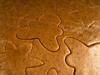 The recipe for making ginger biscuits. Cut cookie dough.