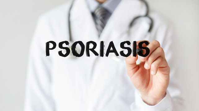 Doctor writing word Psoriasis with marker, Medical concept