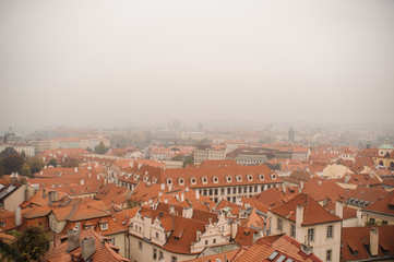 Misty top view of old European town with medieval architecture