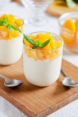 Glasses Of Yogurt With Poached Mango