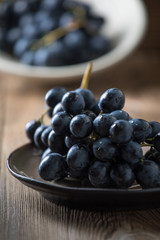 Dark grape in bowl.