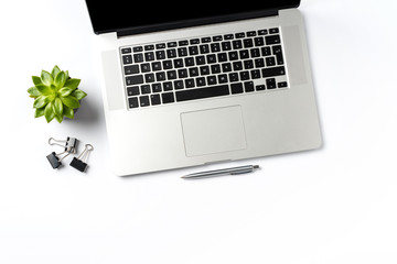 Modern laptop and business accessories isolated on white background