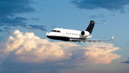 Fototapeta na wymiar Private jet in the air