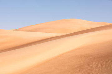 Abstract view of sand dunes in the desert.