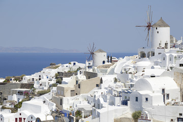 Oia town and its famous windmills on Santorini island, Greece