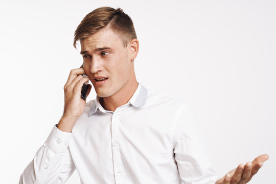 A Business Man Is Having A Difficult Phone Conversation And Is In Difficulty