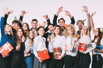 Portrait of a cheerful happy group of friends having a party.