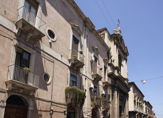 Fototapeta na wymiar View of old, historical building in Catania / Italy. Image shows architectural style of the region.