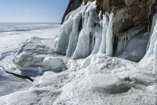 ice on the rocky shore of lake Baikal